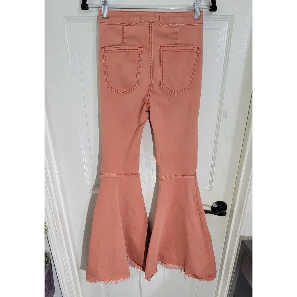 Free People Women's Pink Float‎ On Flared Leg Denim Jeans Raw Hem Size W25